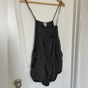 Faded black color string romper with pockets. Perfect for beach!